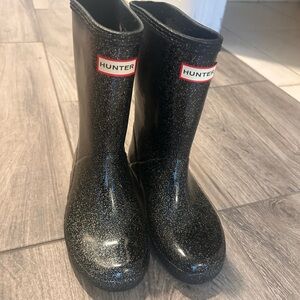 Girls Hunter rain boots size 12. Black glittery print